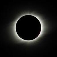 On 2 July 2019, a total solar eclipse passed over ESO’s La Silla Observatory in Chile. This image shows the Sun completely covered by the Moon during totality, revealing the solar corona, or the Sun's atmosphere. While totality only lasted about two minutes, the eclipse overall lasted over two hours and was visible across a narrow band of Chile and Argentina. To celebrate this rare event ESO invited 1000 people, including dignitaries, school children, the media, researchers, and the general public, to come to the Observatory to watch the eclipse from this unique location.