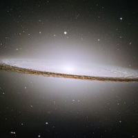 This image of the Sombrero Galaxy is a mosaic of six images taken by the Hubble Space Telescope's Advanced Camera for Surveys in May and June 2003 (exposition time: 10.2 hours).

The famous Sombrero galaxy (M104) is a bright nearby elliptical galaxy. The prominent dust lane and halo of stars and globular clusters give this galaxy its name. Something very energetic is going on in the Sombrero's center, as much X-ray light has been detected from it. This X-ray emission coupled with unusually high central stellar velocities cause many astronomers to speculate that a black hole lies at the Sombrero's center - a black hole a billion times the mass of our Sun.